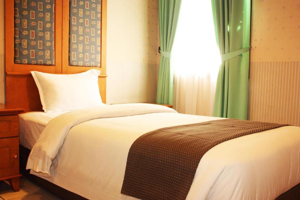 מדאן Travellers Suites Serviced Apartments חדר תמונה