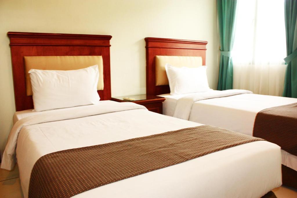 מדאן Travellers Suites Serviced Apartments חדר תמונה